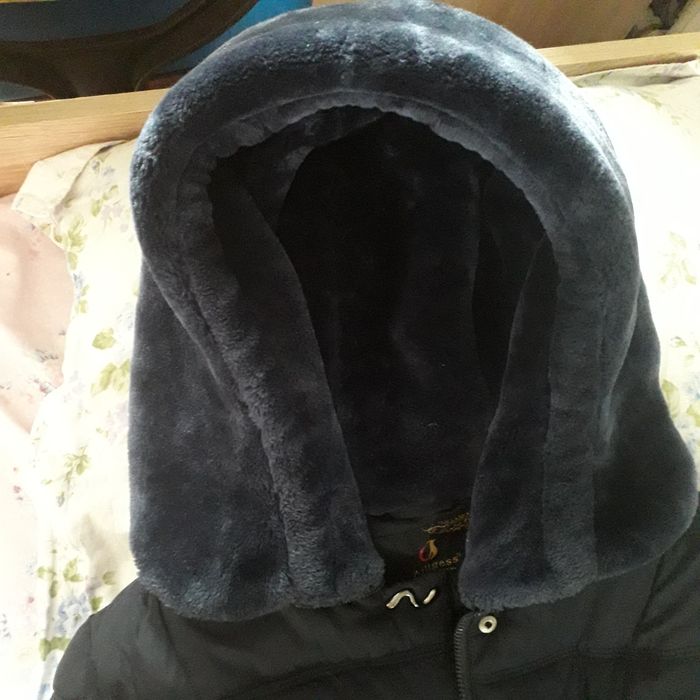 Зимняя пуховое  пальто.