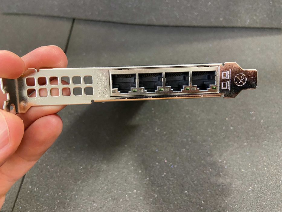 Broadcom 5719 4x 1GbE RJ-45 FP гигабитов мрежови адаптер