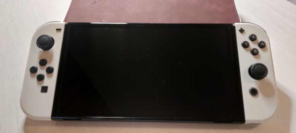 Nintendo Switch OLED - garanție Altex nov. 2026