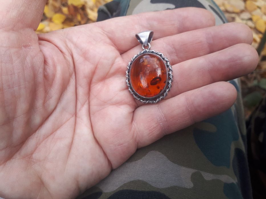 Серебряный кулон.