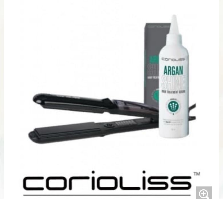 Преса за коса с бутилка с арган към нея