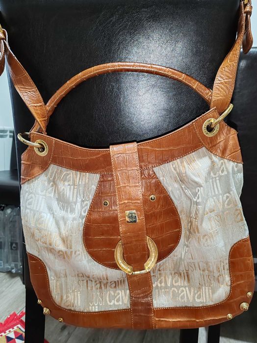 Geantă damă, din piele originile, cum se poate vedea în poze