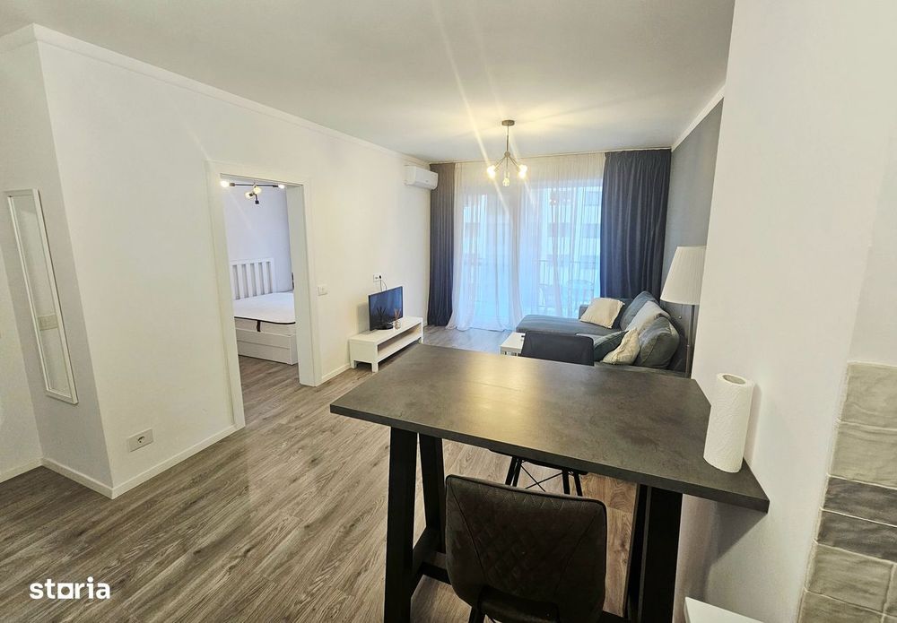 Dau în chirie apartament modern 2 camere-cartier Prima Onestilor