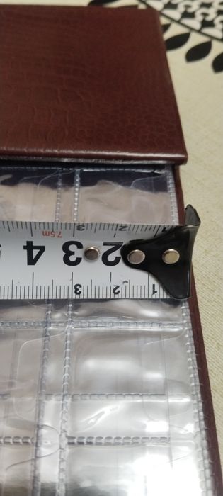 Продается альбом для монет 120шт.для разных размеров