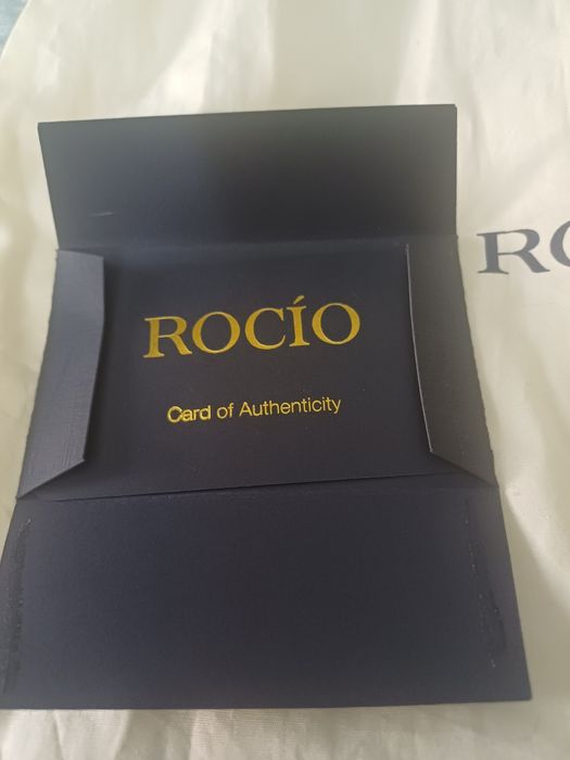 Клатч от дорогого британского бренда  ROCIO