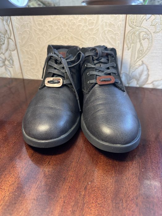 Кожанные ботинки Lacoste