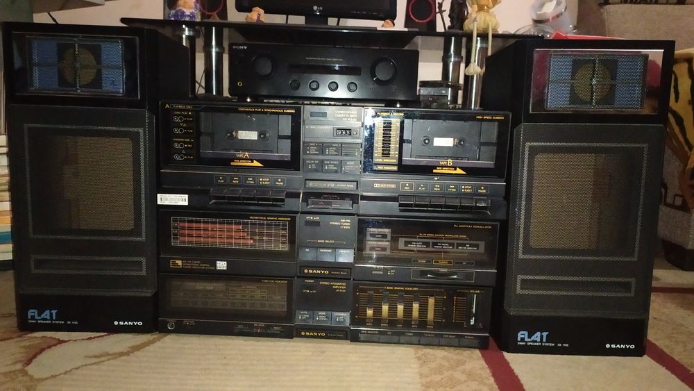 Продам  спут тюнер Star track str2016  муз центр Sanyo 6100