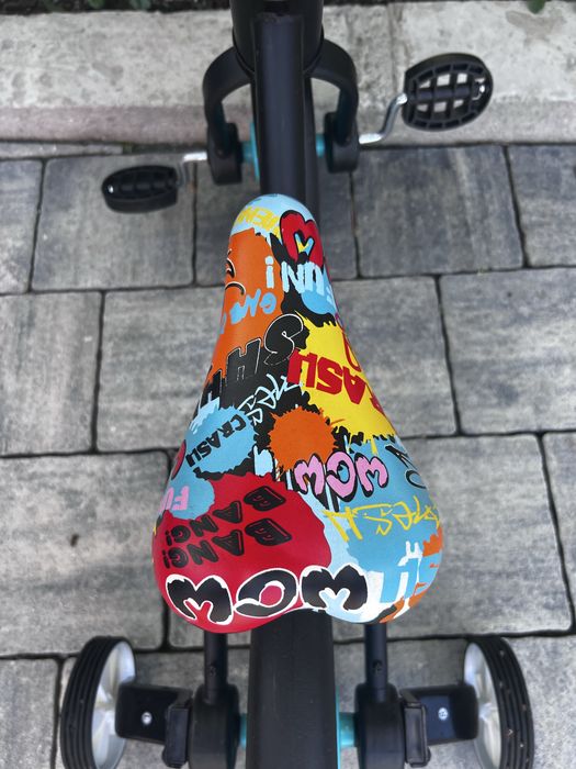 Bicicleta cu roti ajutatoare