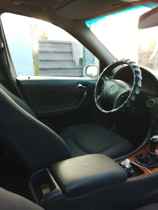Мерседес Бенц W203
