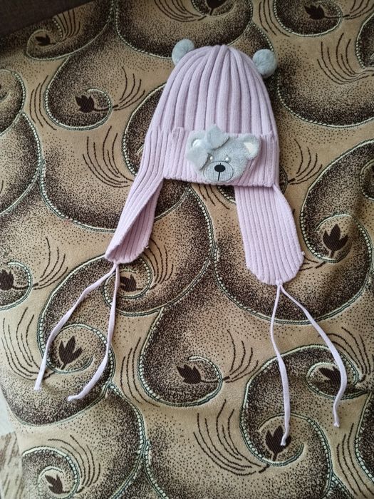 Продам детскую шапочку на девочку