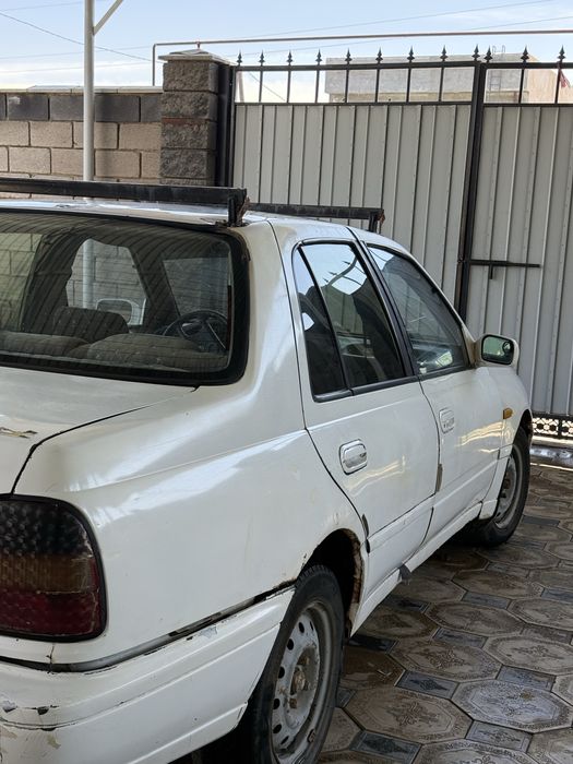 Ауди 100 Ниссан сани