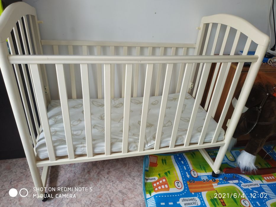 Детская кроватка качалка