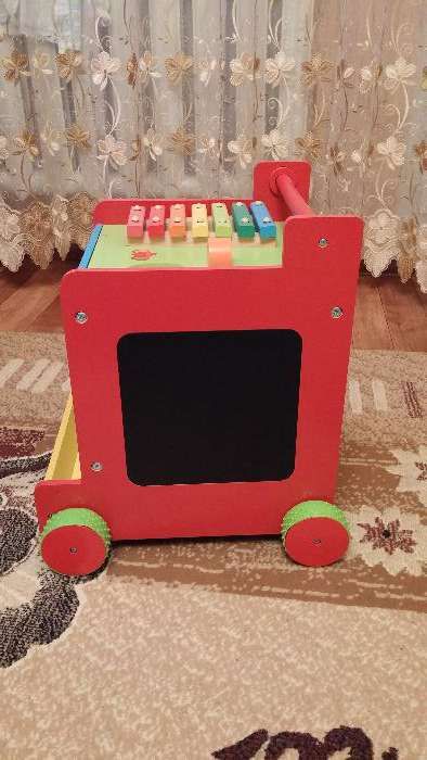 Развивающая игрушка-каталка