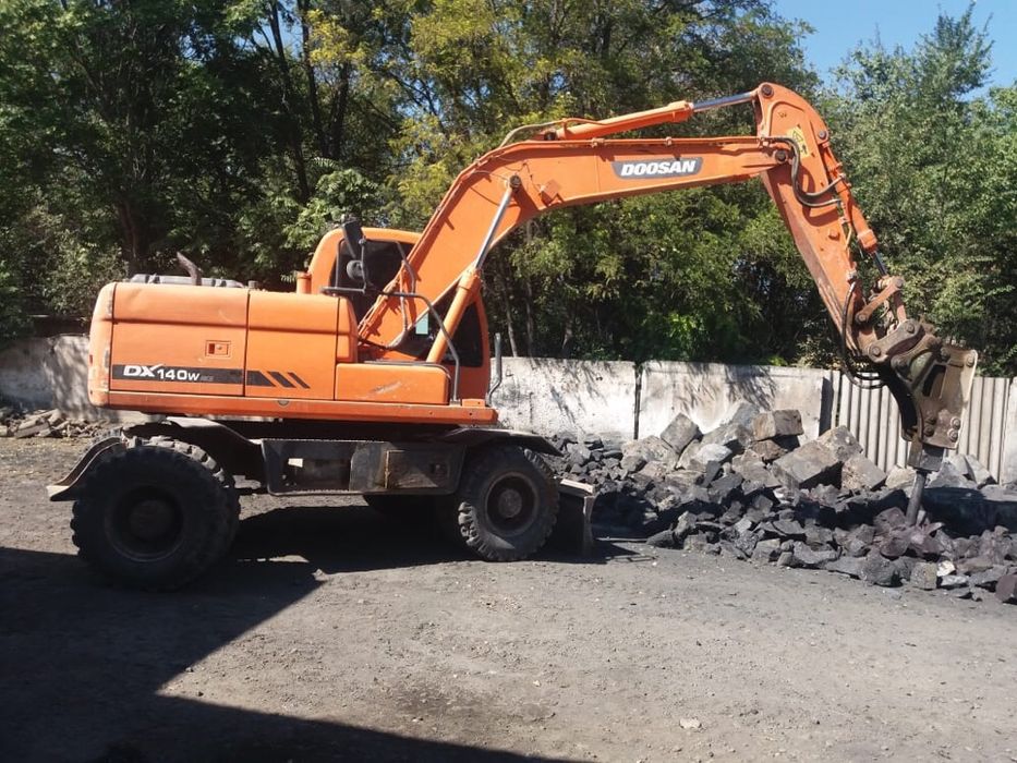 Услуги экскаватора с гидромолотом