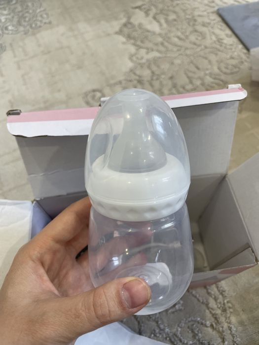 Электрический молокоотсос