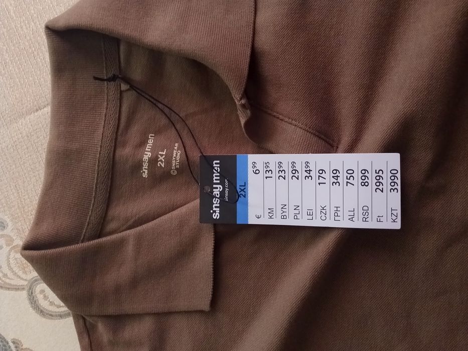 Продам новую футболку