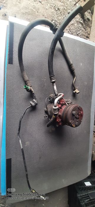 Компрессор кондеционера