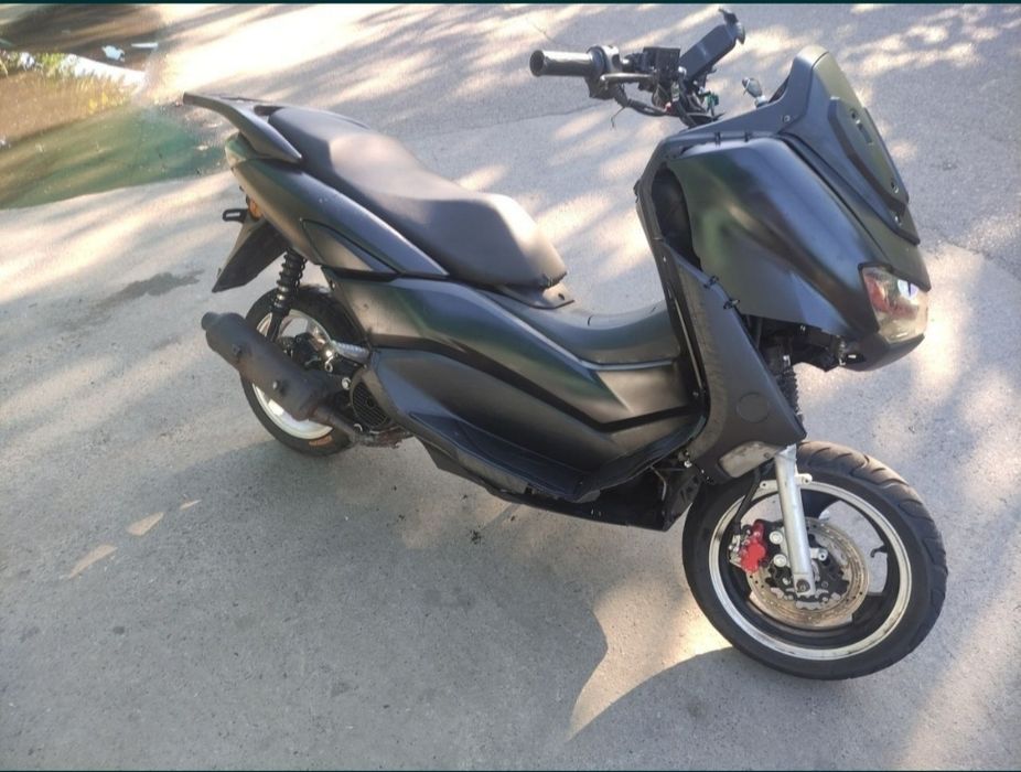 Motosikl benzinli holati o'rtacha