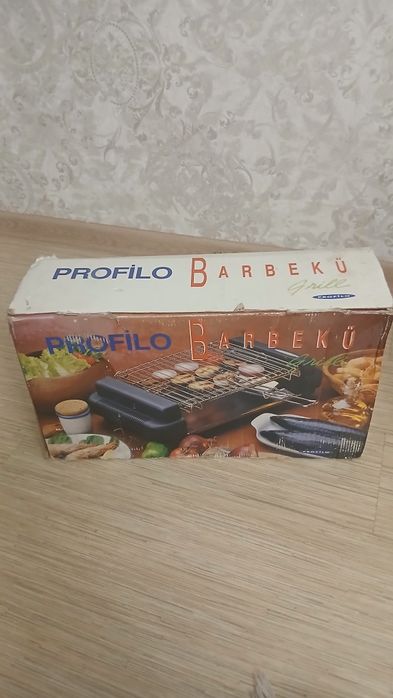 Электрогриль . Почти новый