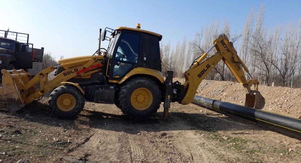Услуги экскаватора погрузчика