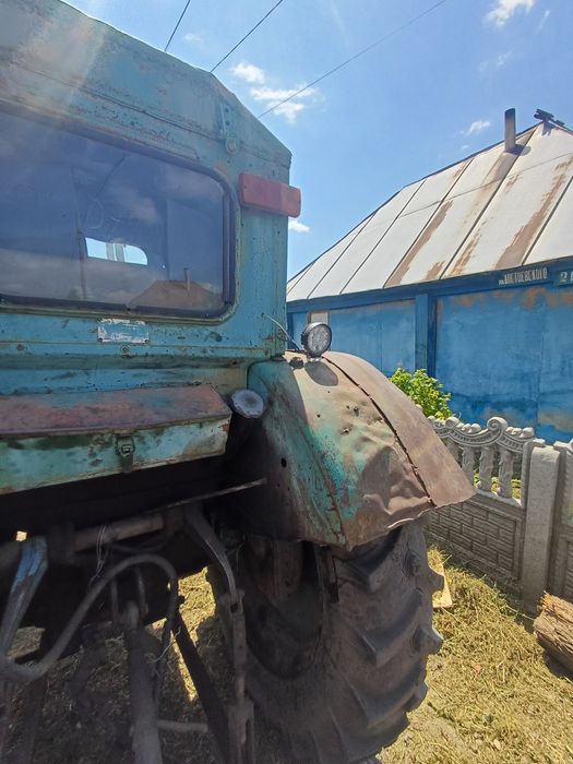 Трактор т40 плуг телега хтс