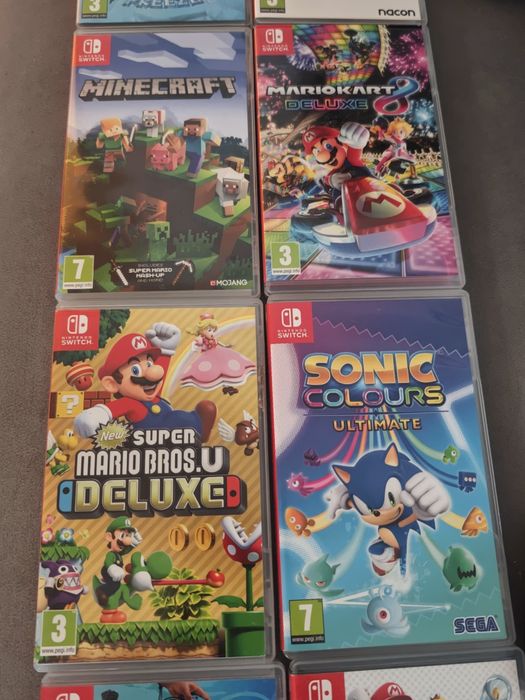 Nintendo Switch OLED + Dock + Pro Controller + 8 игри + куфарче