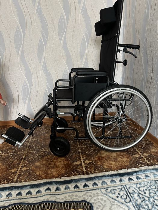 Инвалидное коляска.