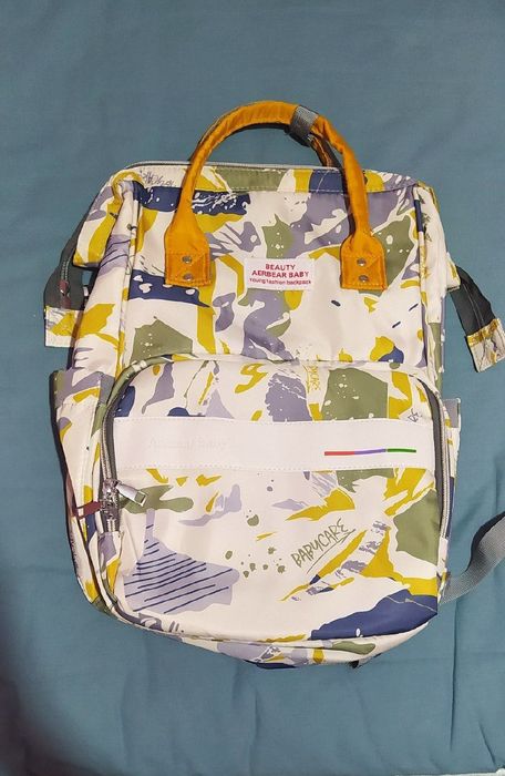 Мама рюкзак почти новый.