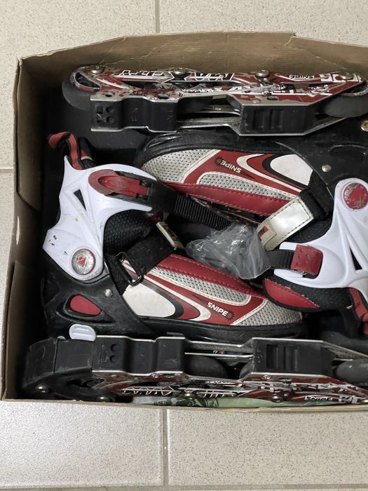 Ролики/коньки красные