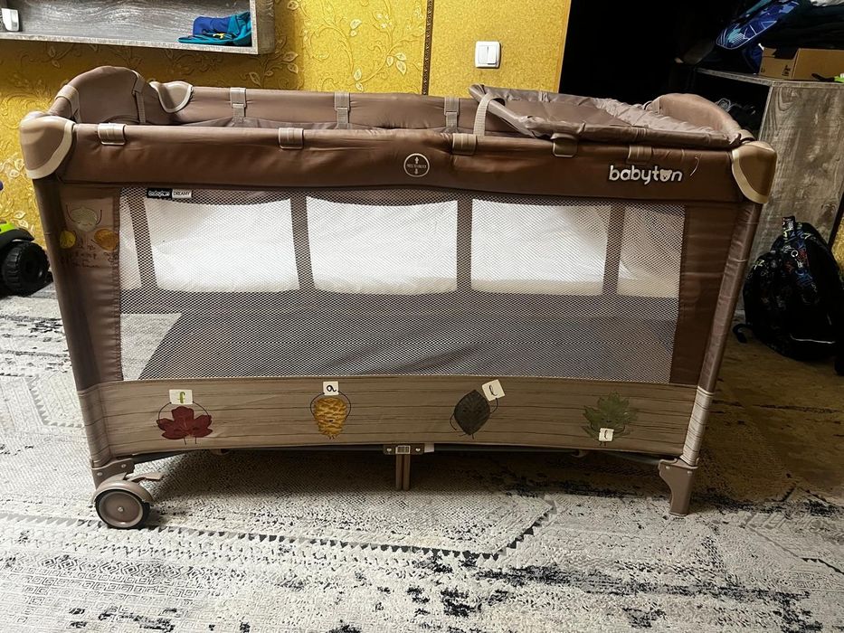 Детская кроватка - манеж