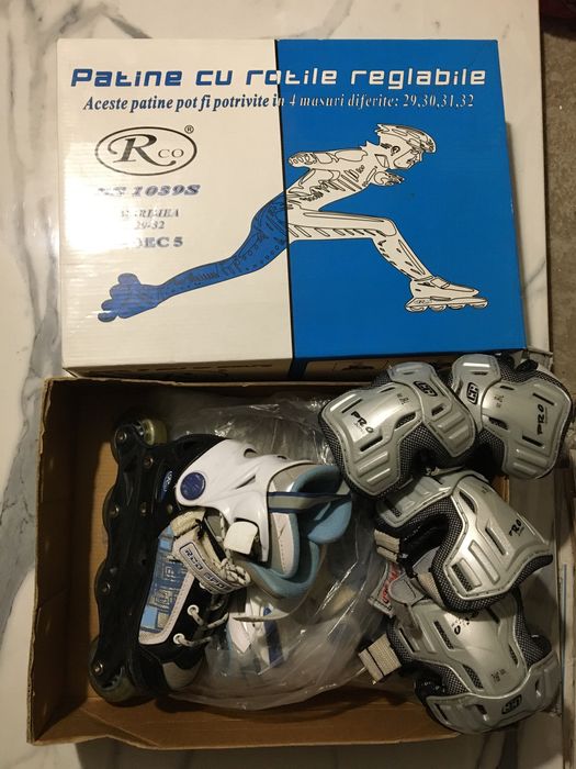 Penny board si role cu echipament de protectie