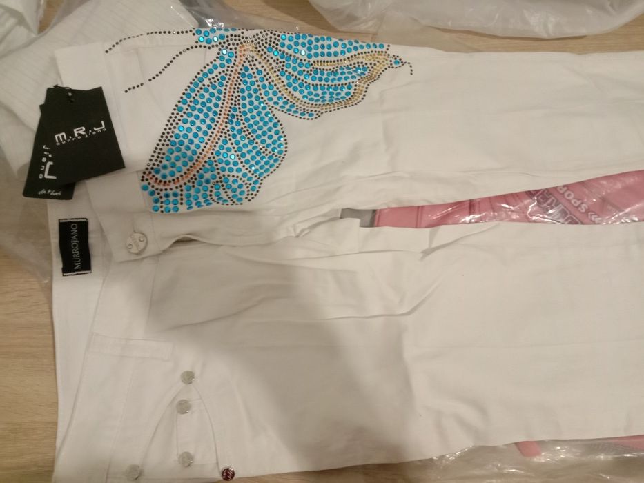 Брюки- джинсы новые