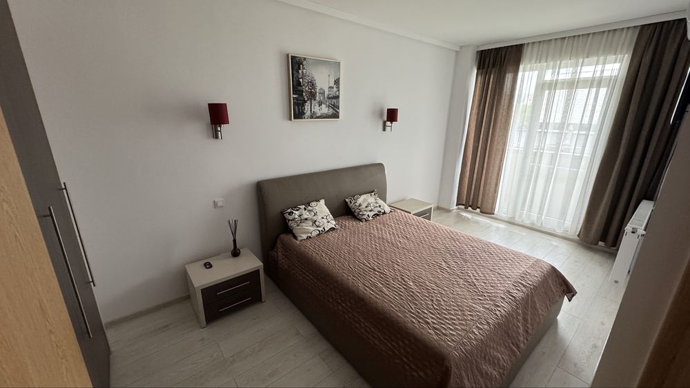 Inchiriez apartament 2 camere zona centrala str traian mobilat modern cu parcare subterana inclusa etaj3 bloc nou
