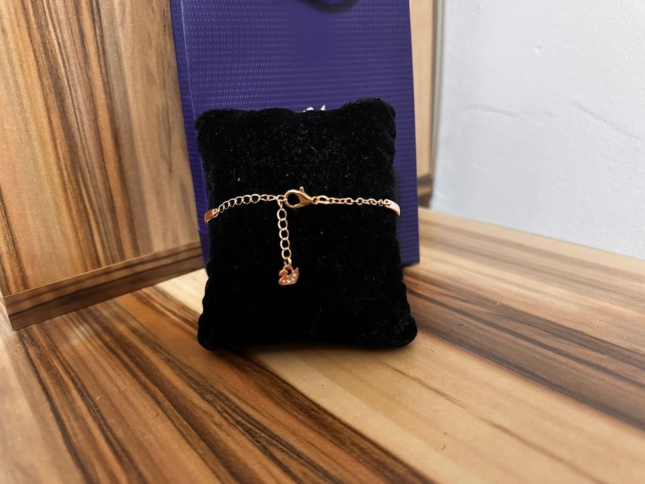 Brățară Swarovski lebădă pietre albe rose gold