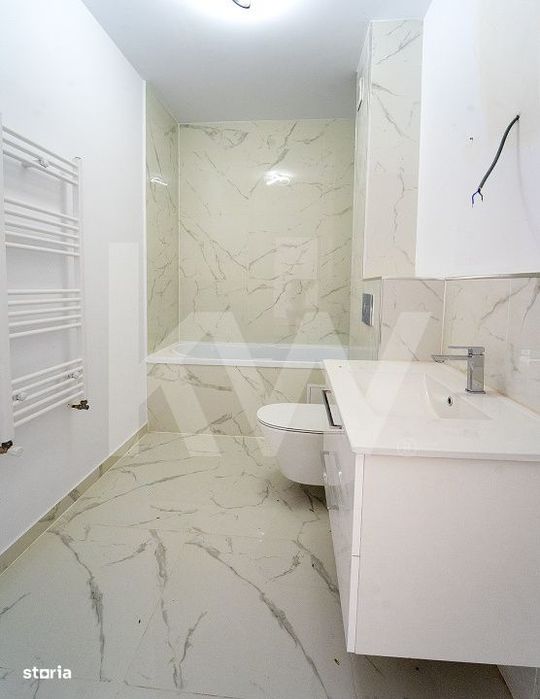 Apartament 3  camere - finisat la cheie, intabulat