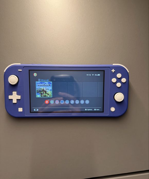Nintendo Switch Lite ca nou + Joc Minecraft