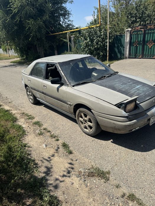 Продам машину мазда 323