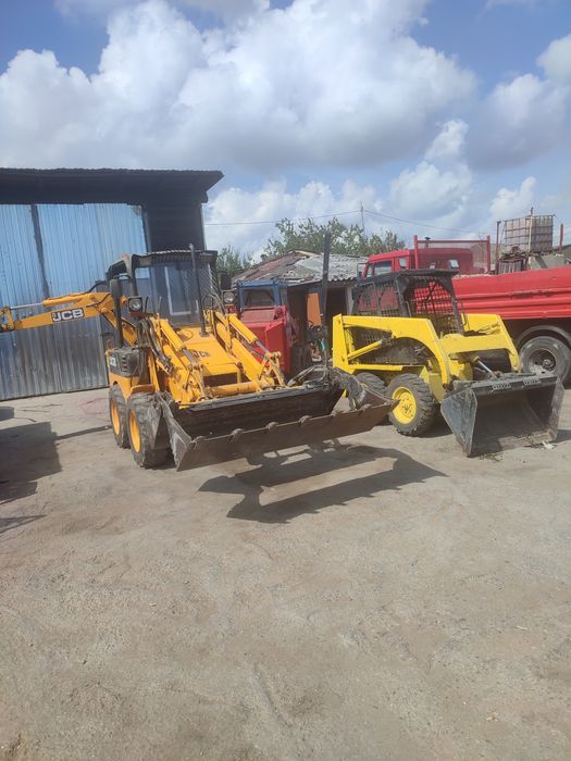 Închiriere Buldoexcavator CX1 Bobcat Cilindru Compactor Moniexcavator