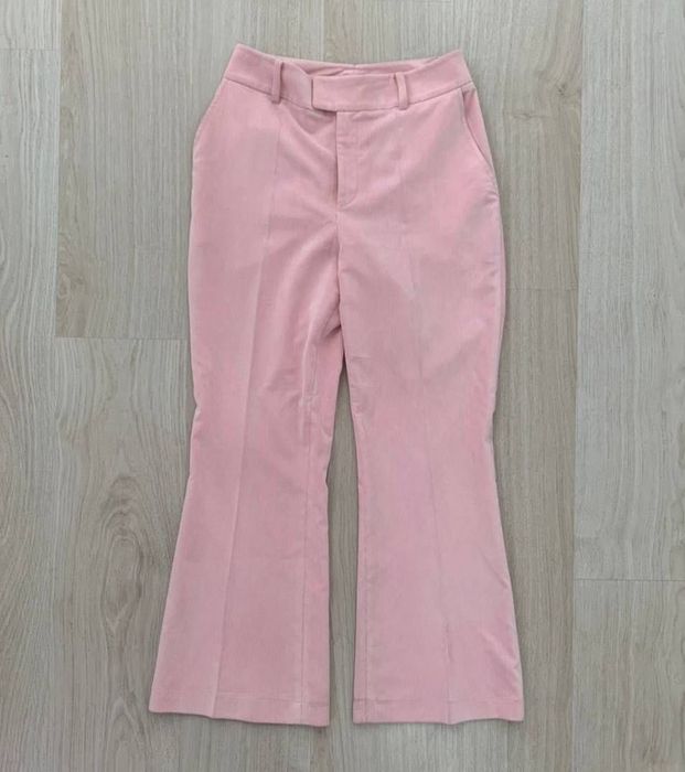 Розовые вельветовые брюки