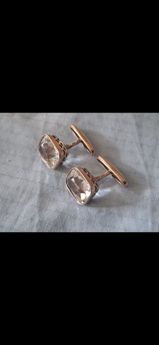 Серебряные запонки.