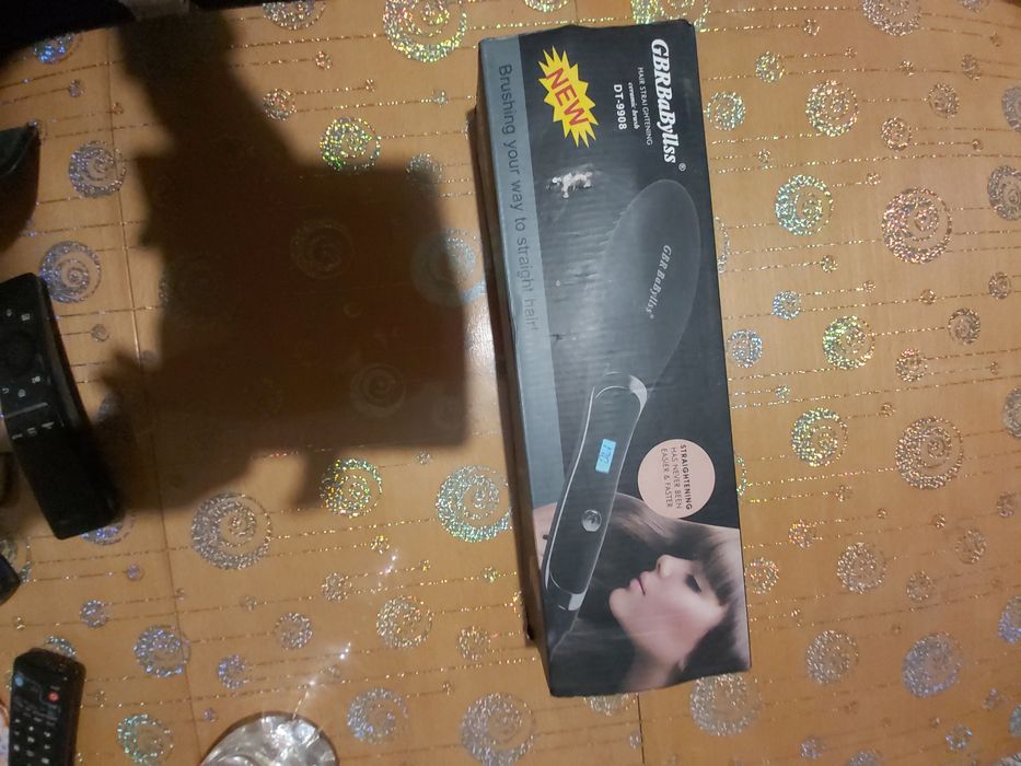 Четка за изправяне на коса