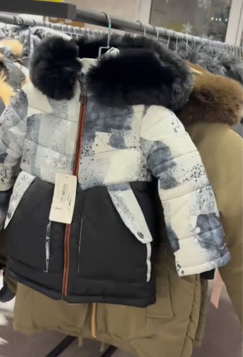 Новый пуховик 110 см