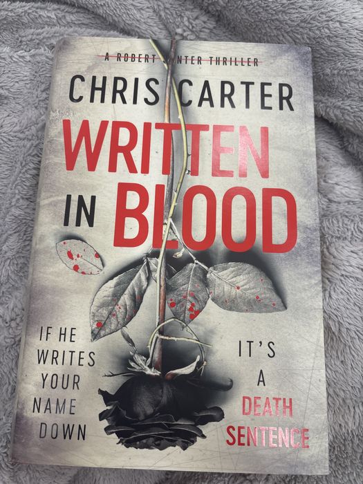 ,,Written in blood”- Chris Carter