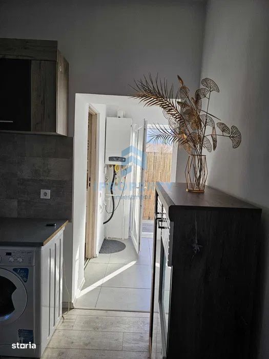 Inchiriere Casa 2 camere +curte  zona Rahova
