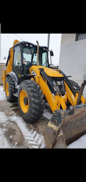 Услуги экскаватора погрузчика три в одном  трактор