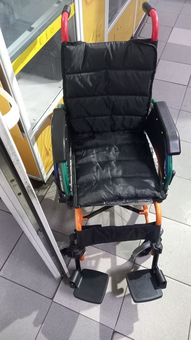 Инвалидная коляска.