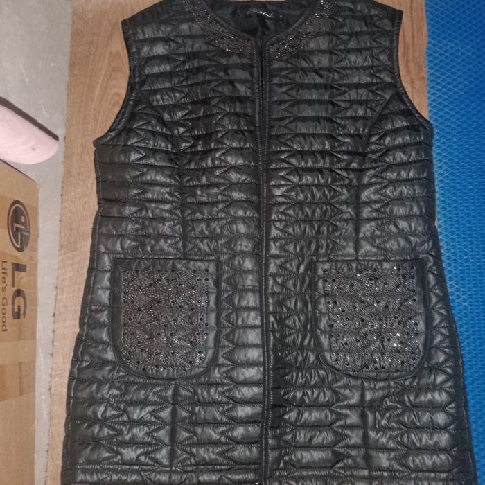 Продам жилет женский