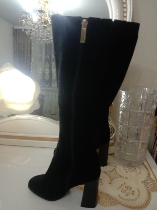 Продам новые зимние сапоги