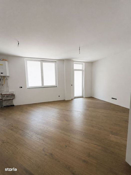 Apartament 3 camere, 2 bai, etaj intermediar, balcon, garaj, boxa — fotografia 1