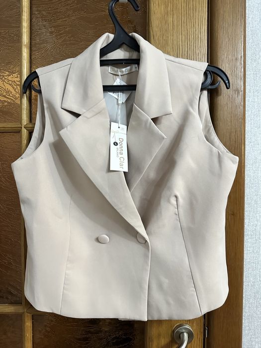 Жилетка новая